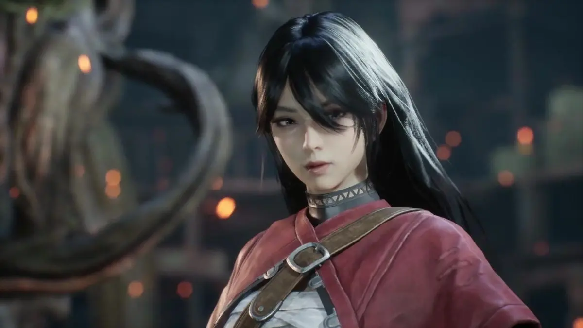 Close-up of Emma Koo from Beast of Reincarnation with long black hair and red traditional clothing