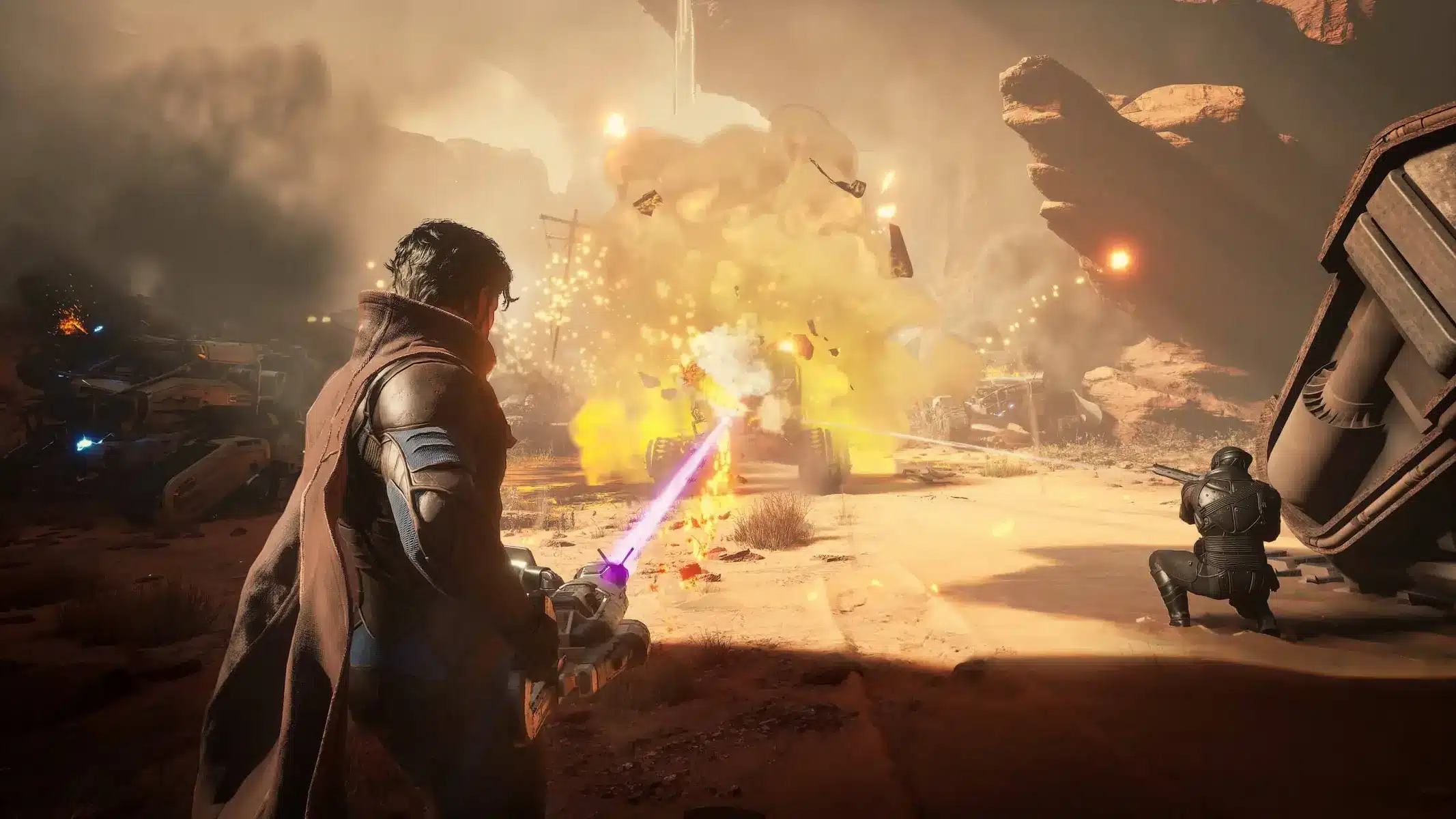 Third-person gameplay view of a character firing a purple laser weapon during a desert explosion