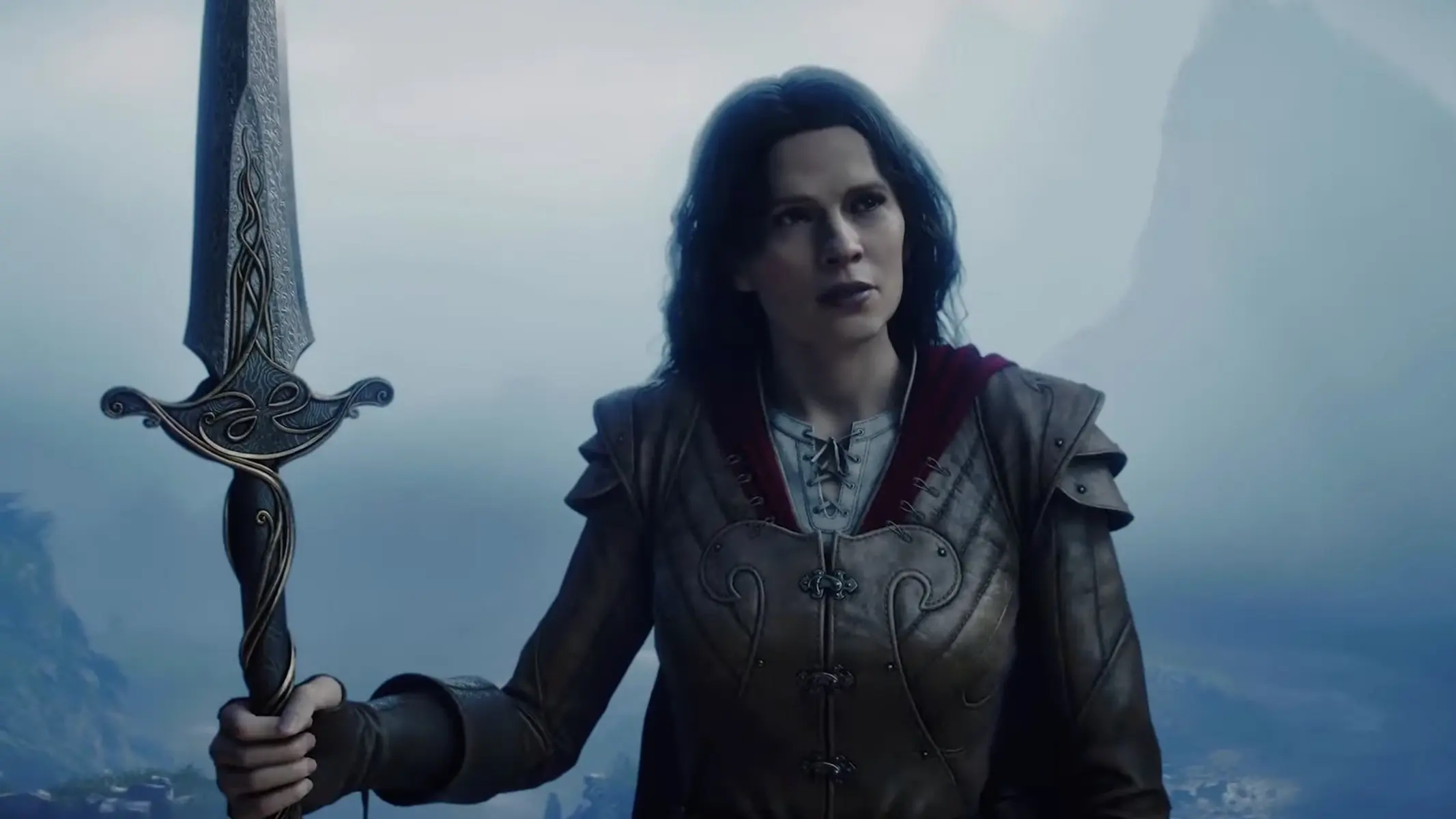 A woman with dark hair wearing leather armor and holding a decorative sword in a misty landscape.