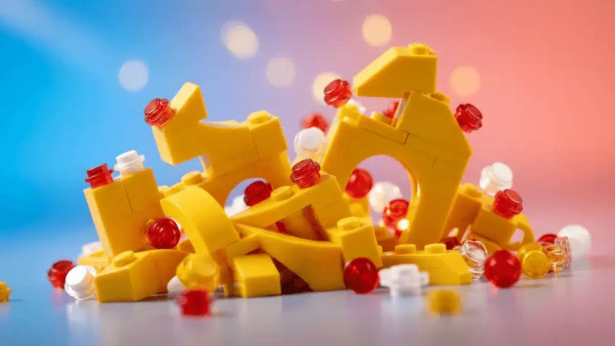 LEGO bricks in yellow and red arranged creatively, representing LEGO Pokémon GO collaboration event