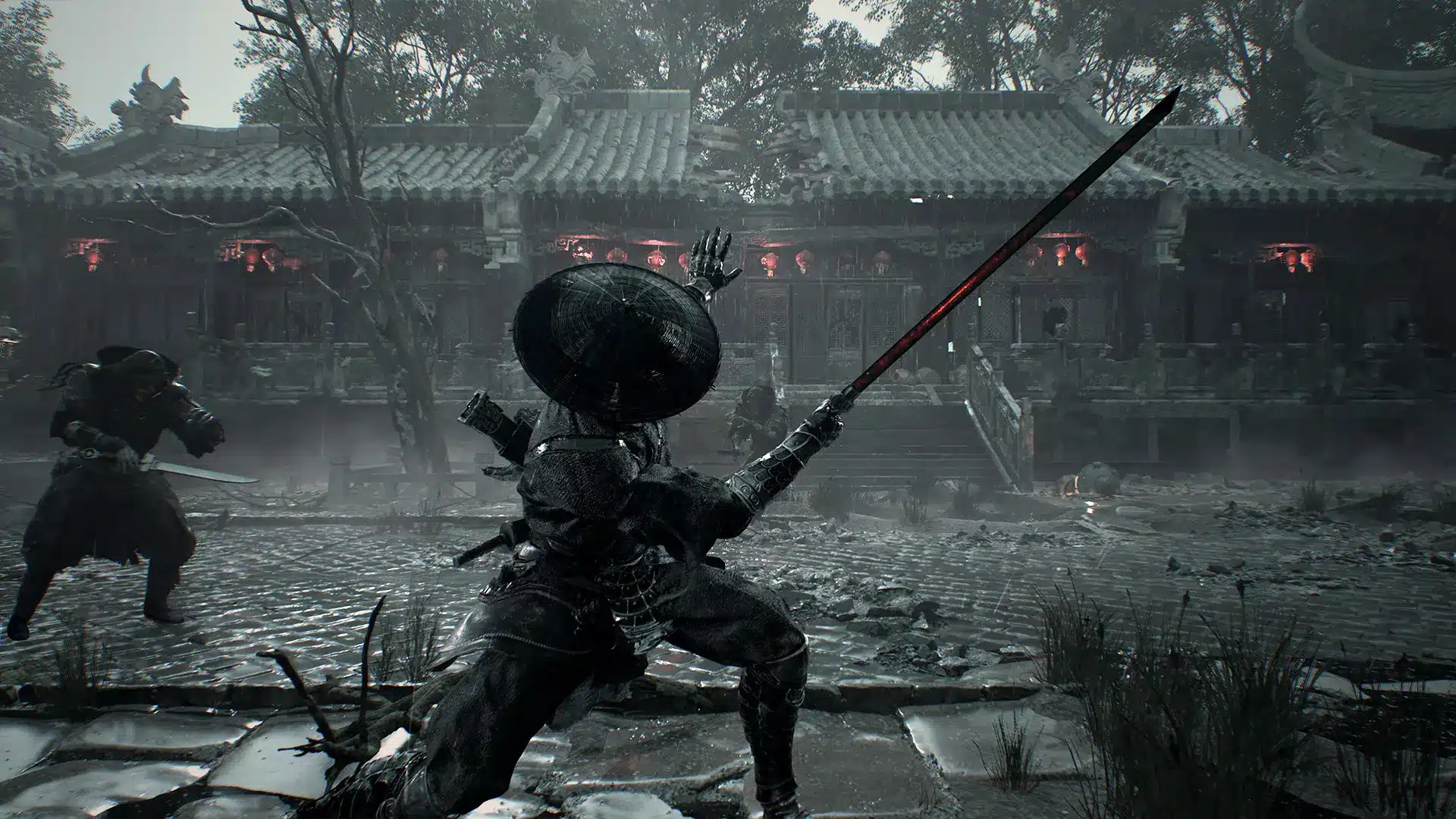 A warrior in dark armor with a conical hat wielding a long katana in a desolate Asian-style temple courtyard.