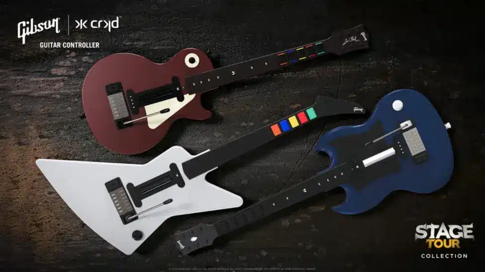 Three Gibson guitar controllers in red, white, and blue for the Stage Tour Collection