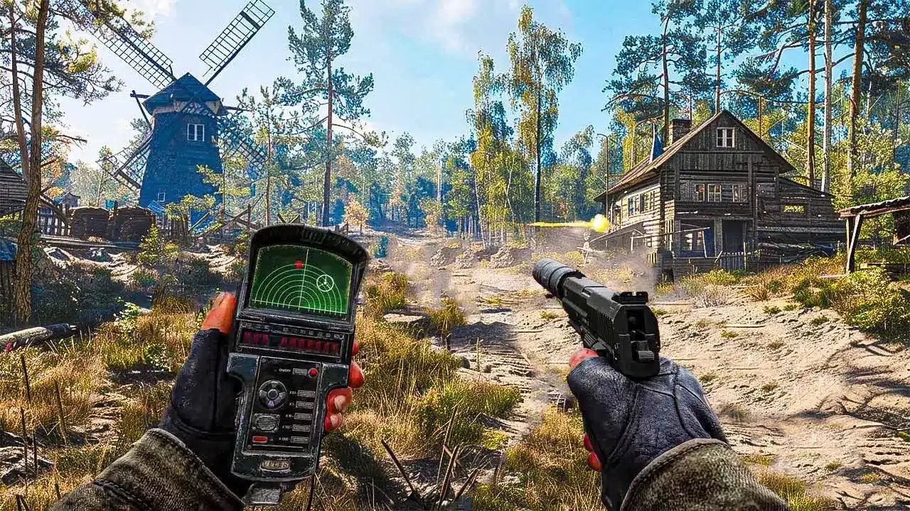 First-person perspective of a character holding a PDA detector and a handgun in a wooded village with a windmill