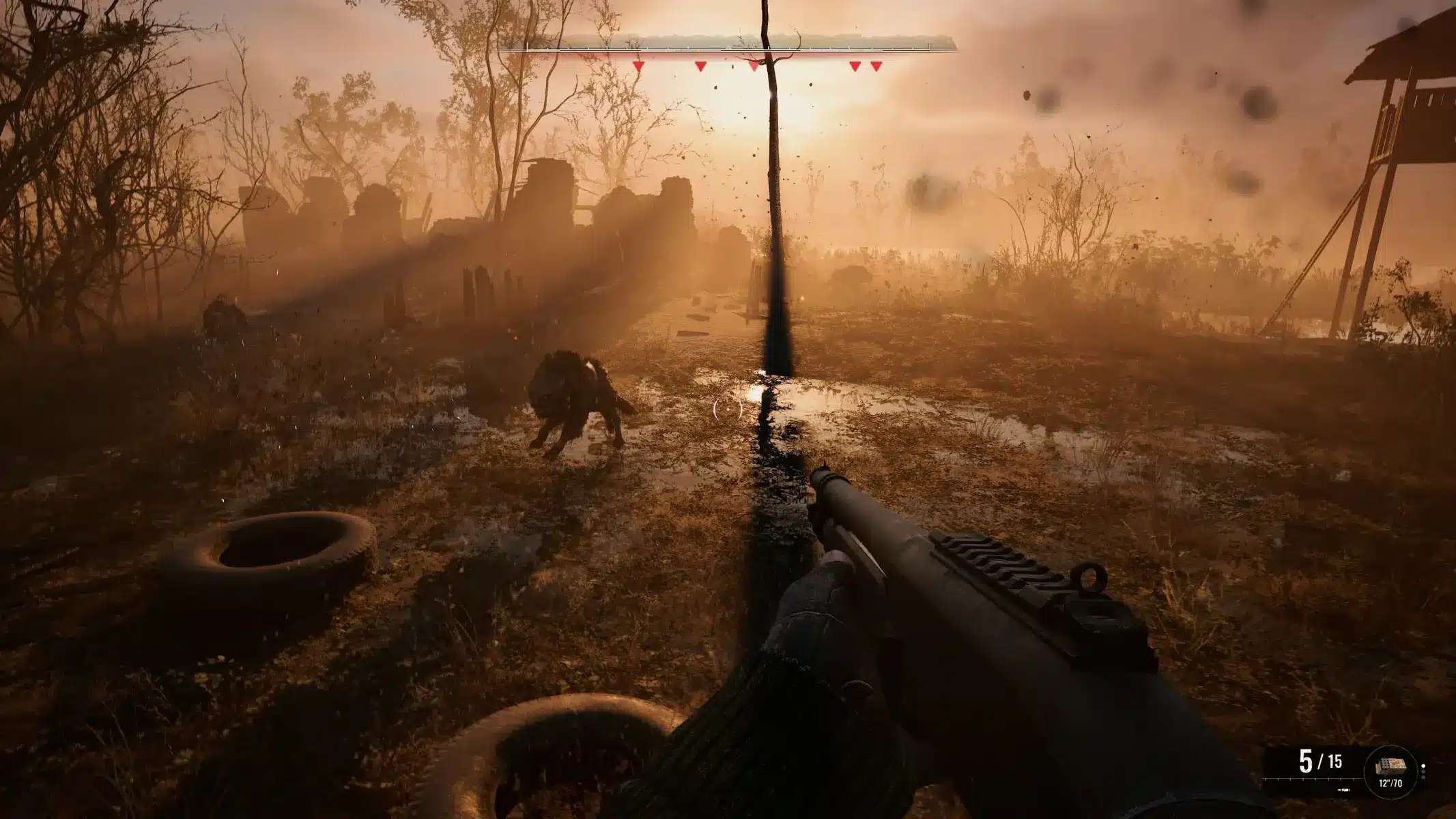 First-person view in S.T.A.L.K.E.R. 2 holding a rifle facing a mutant in a misty, ruined wasteland