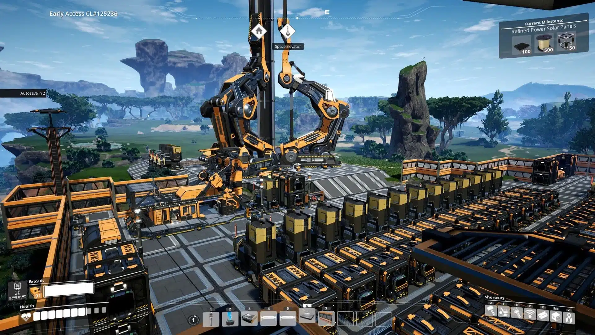Ein Screenshot aus Satisfactory mit einer großen Fabrikanlage und dem Weltraumaufzug im Hintergrund.